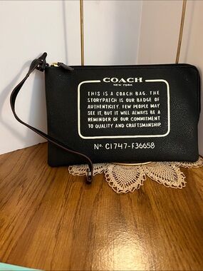 Coach Black Leather Wristlet with White Logo Text